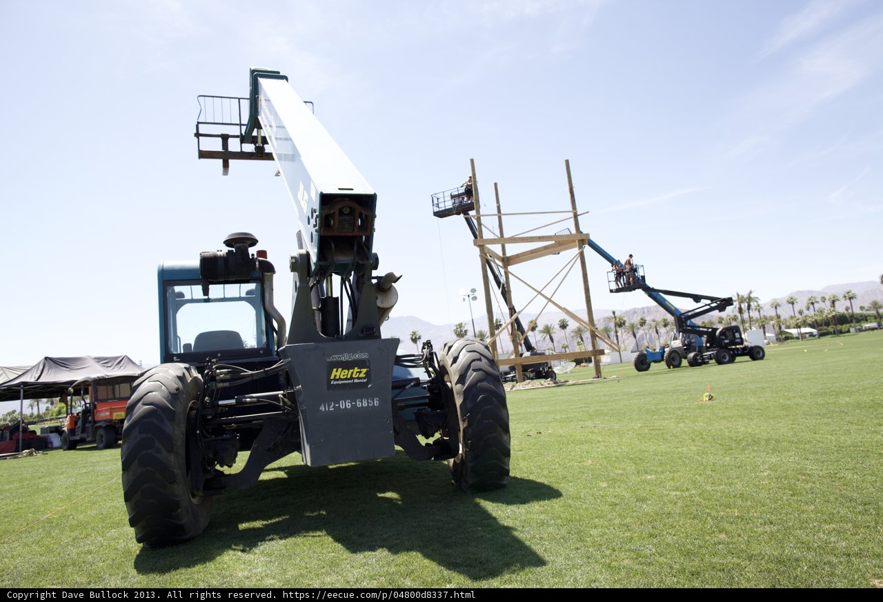 Parked Tractor in Grassy Field