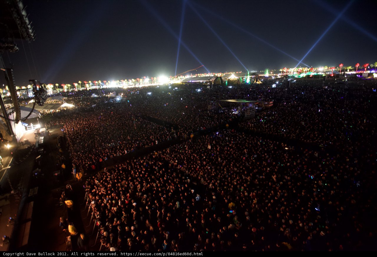 Night Sky Illuminated by Concert Crowd