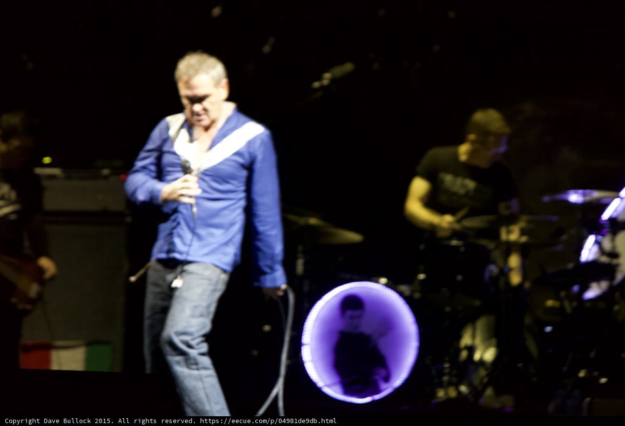 Morrissey Three Quarter Looking Down Blue Shirt Necklaces LED Drum Head Purple Silhouette Drummer Italian Flag