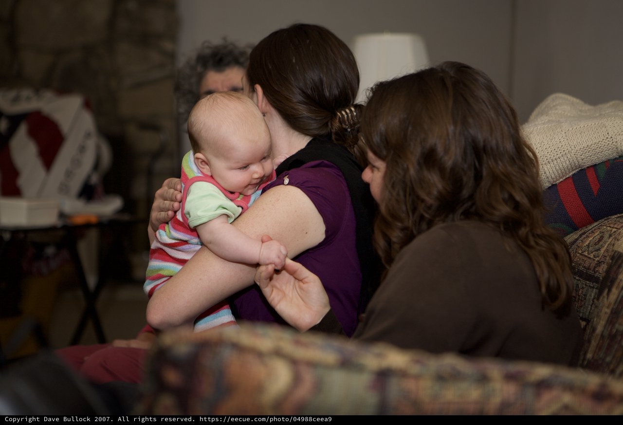 Tender Moment: Mother and Baby Sharing a Kiss
