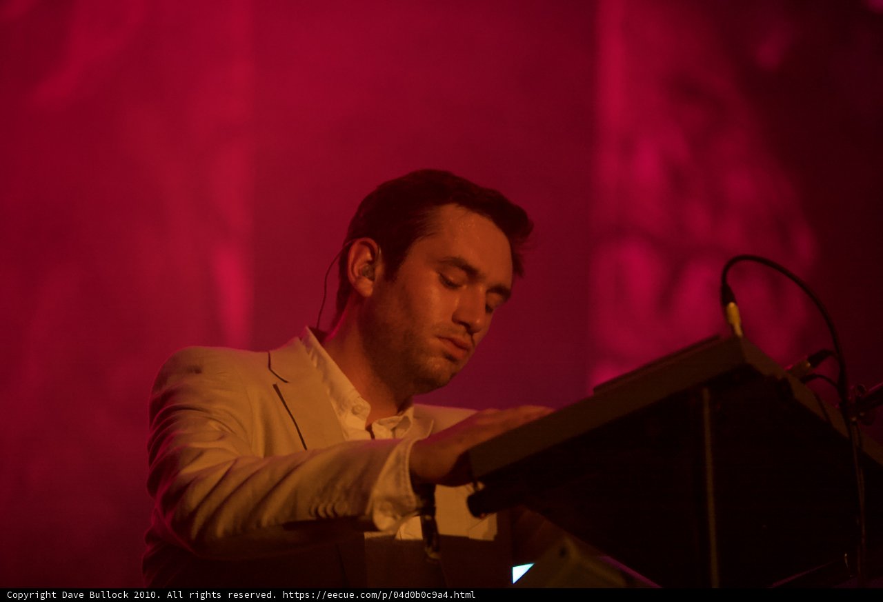 White-suited pianist
