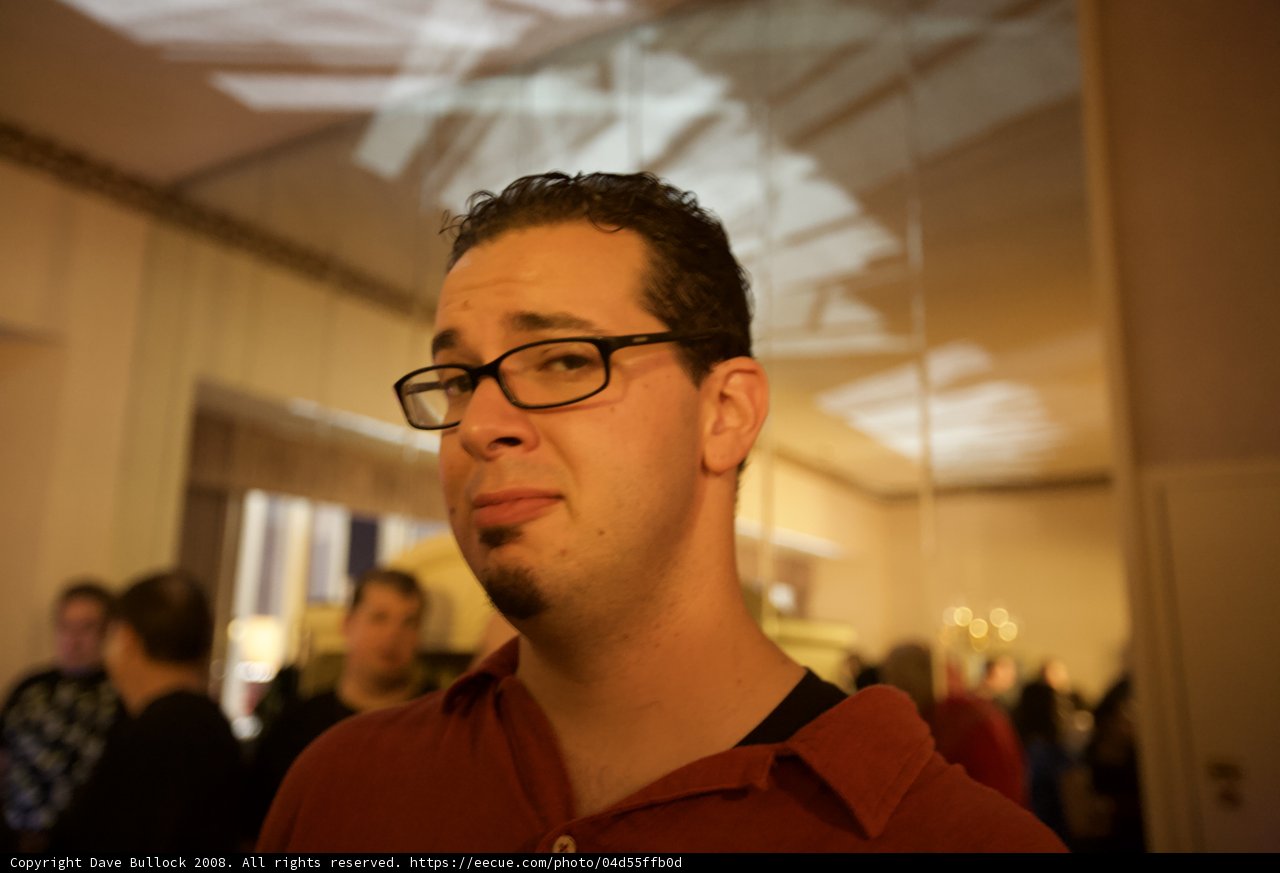 Dave B rocking his red shirt and eyeglasses