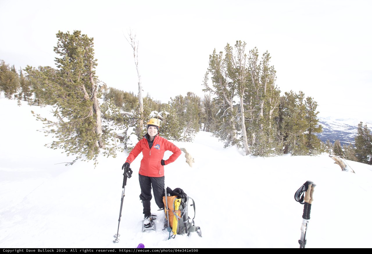Snowshoer Pauses at Snowy Tahoe Ridge in Winter