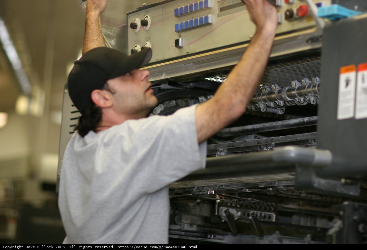 Printing Machine Worker