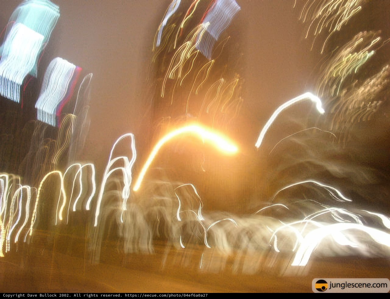 Blurred City Lights with Flares