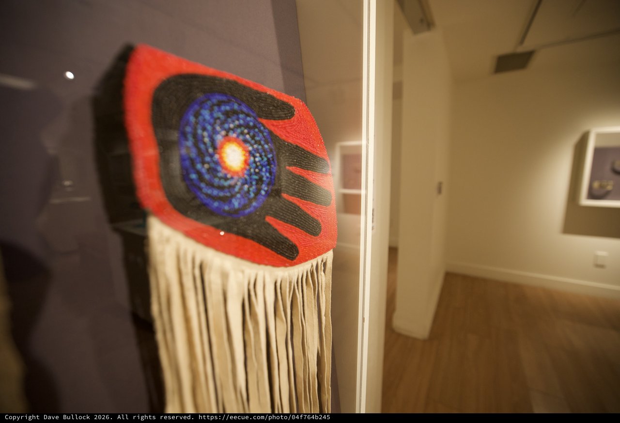 Contemporary Indigenous Textile Art with Spiral Galaxy Motif
