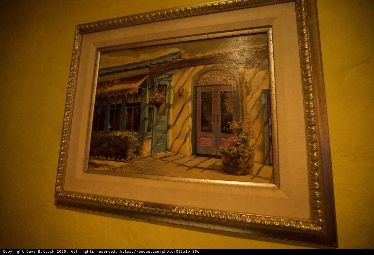 Framed Painting of Southwestern Courtyard with Blue Door