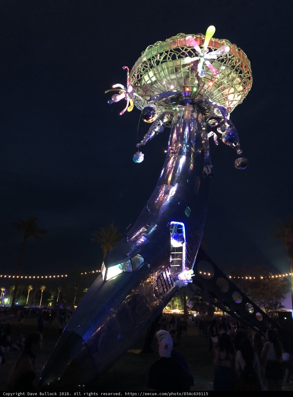 Illuminated Statue in the Night Sky