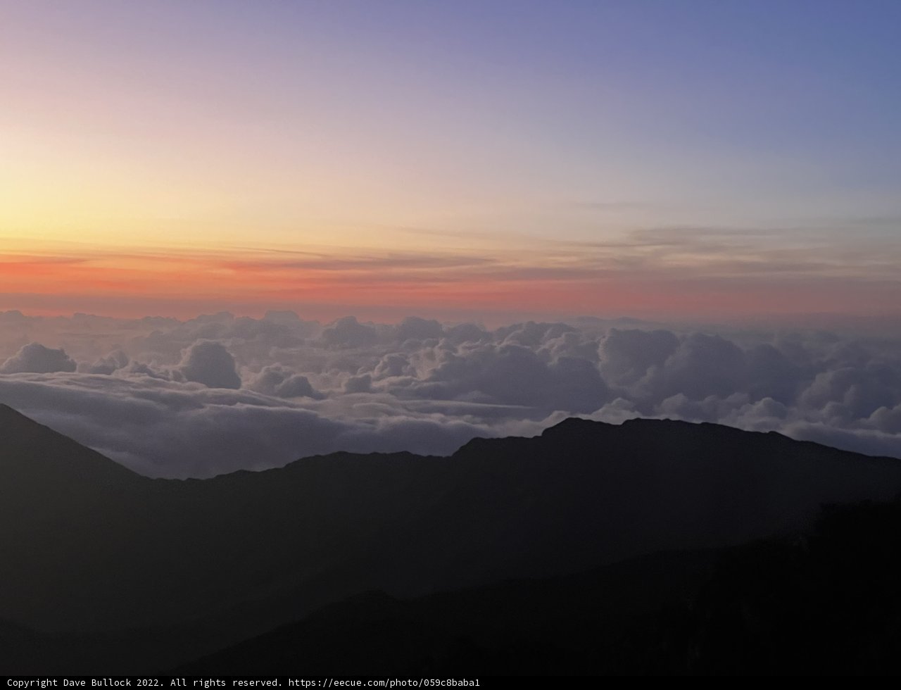 Summit Sunrise Above the Clouds