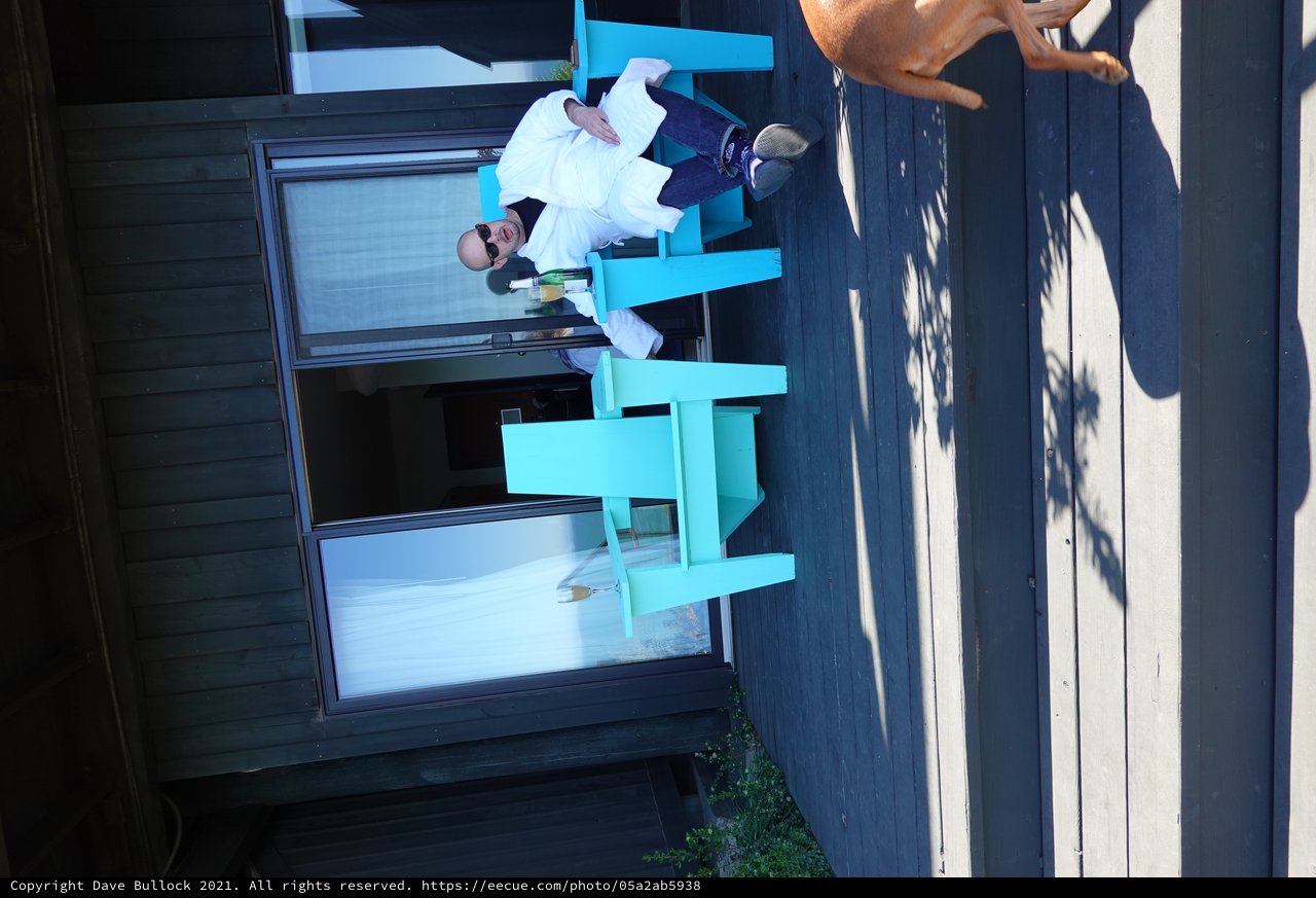 Relaxing on Modern Patio with Turquoise Furniture