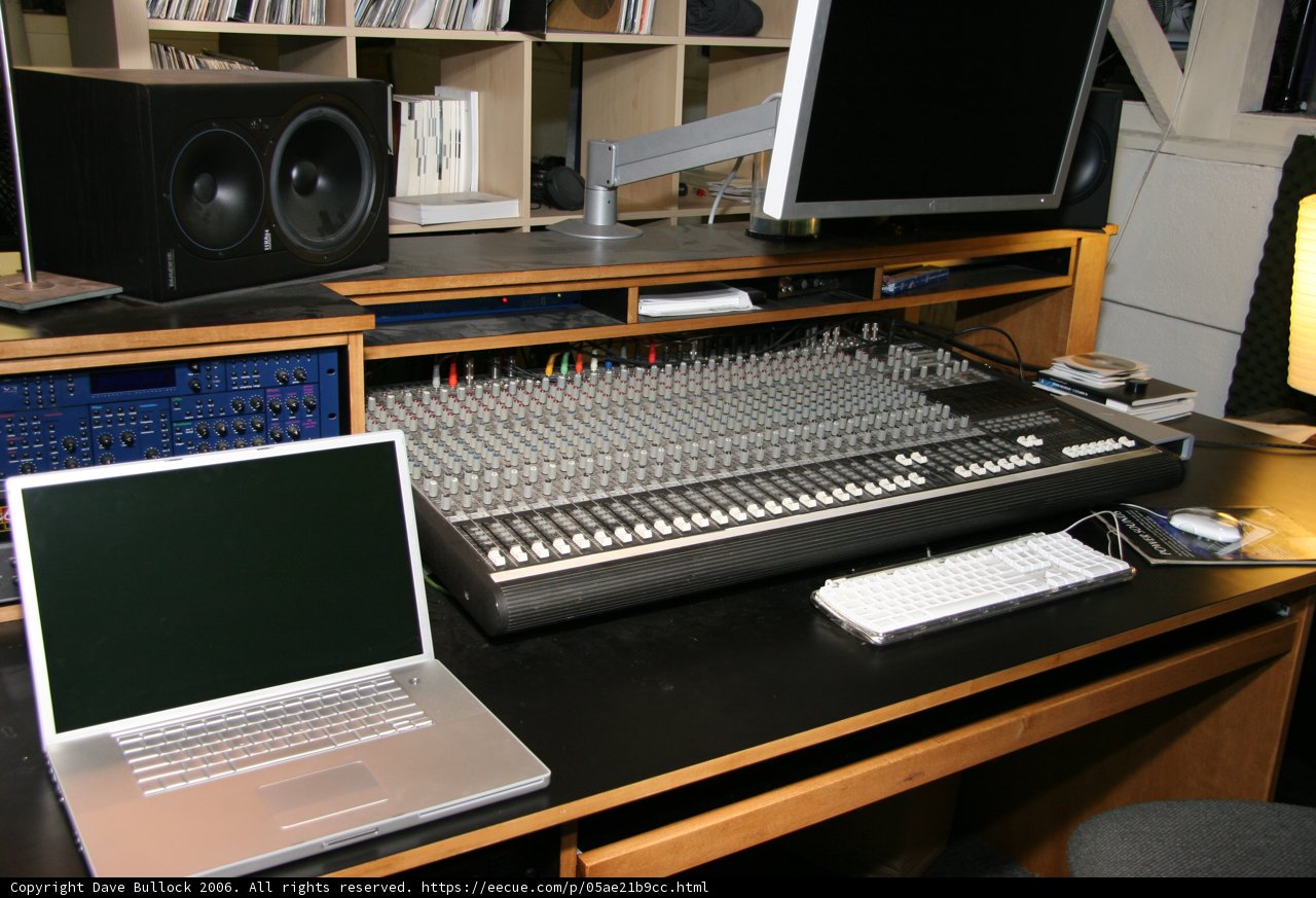 Black Desk with Computer and Speakers