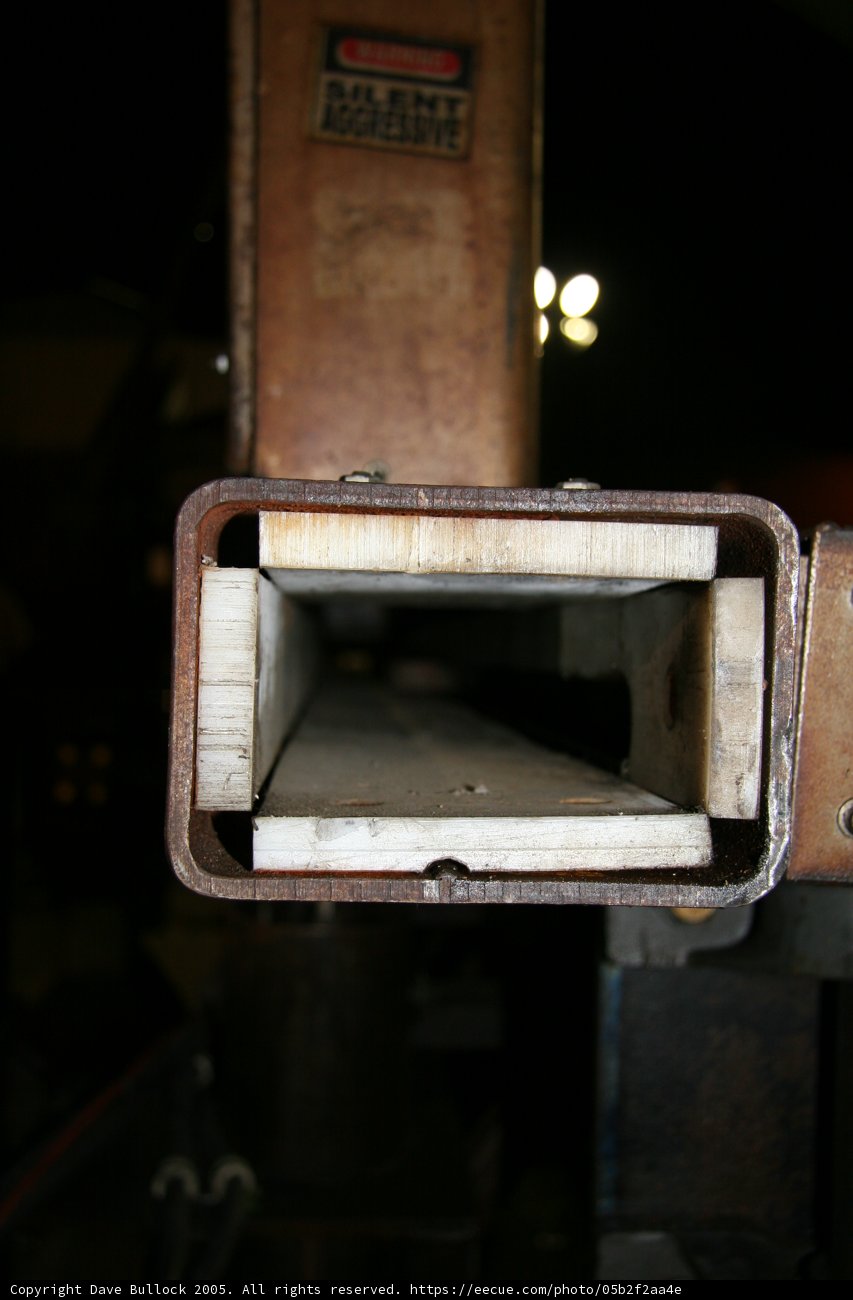 Rusty Metal Mailbox with a Hole