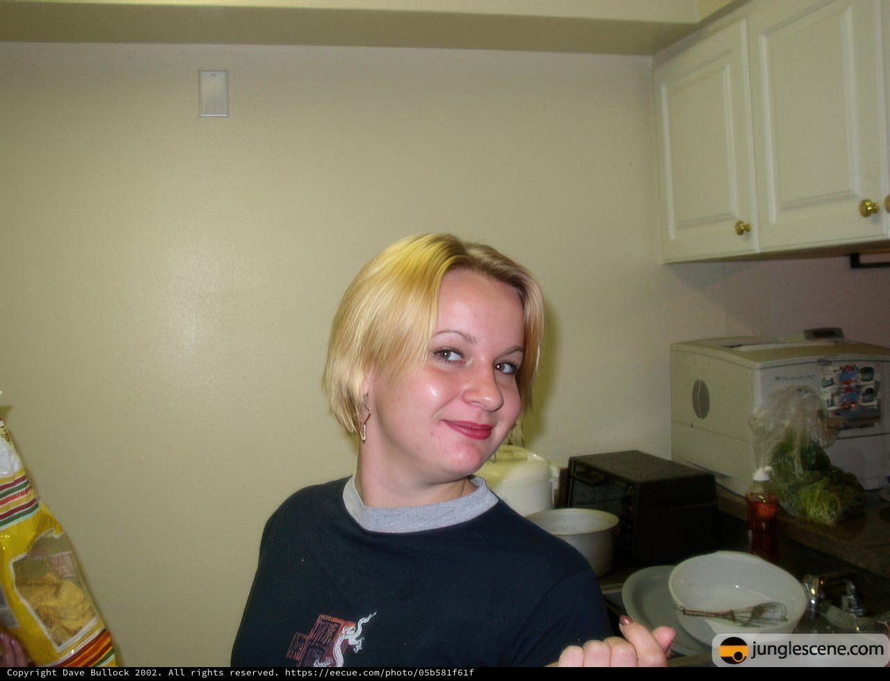Woman Enjoying Her Meal in a Stylish Dining Room