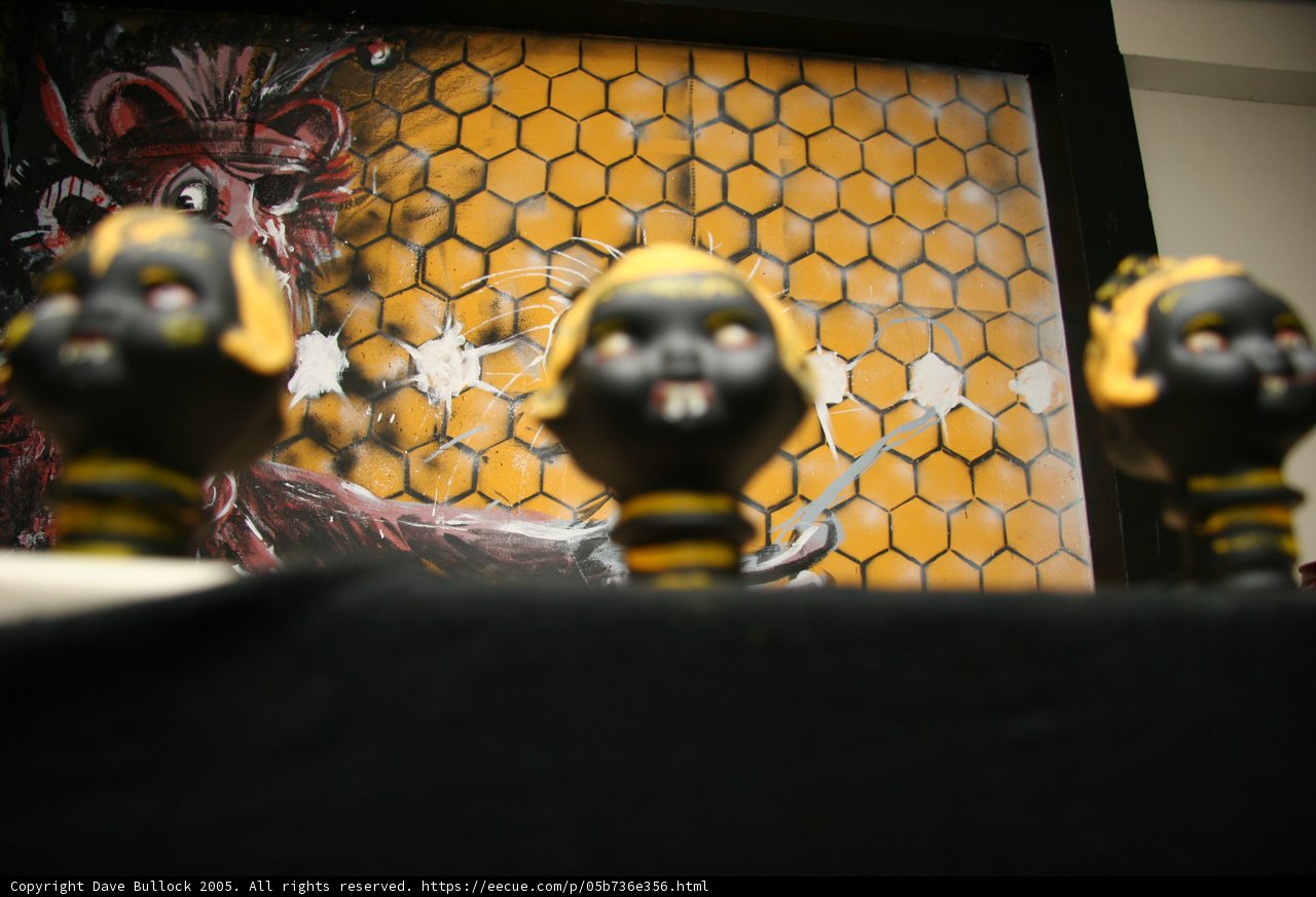 The Trio of Black and Yellow Dolls