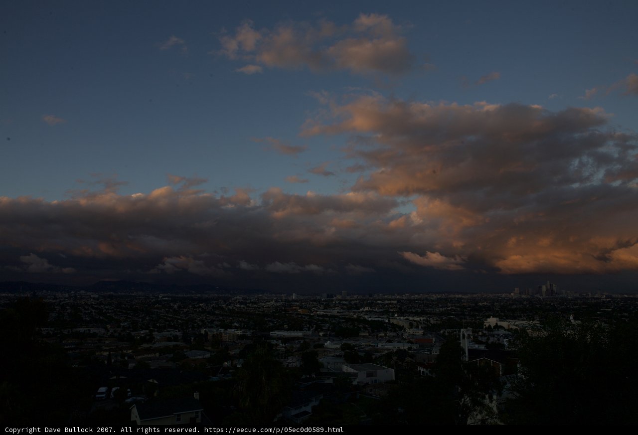 City at Sunset under Cumulus Clouds