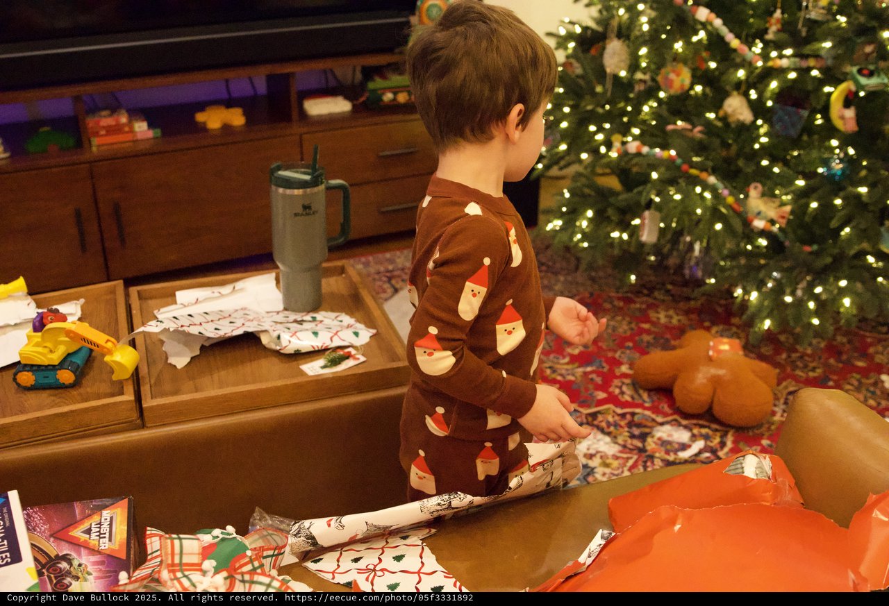 Christmas Morning Gift Opening in Festive Living Room