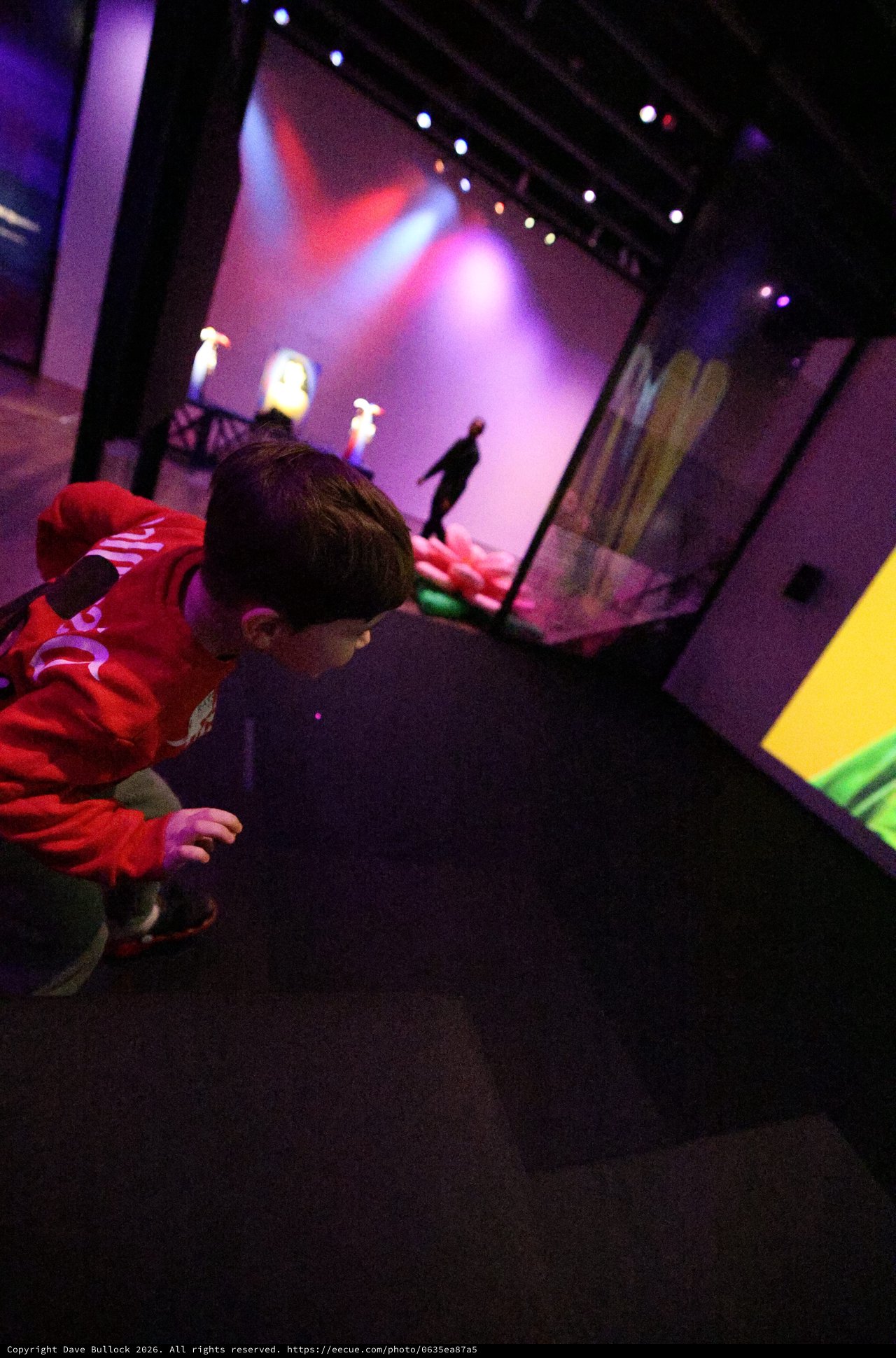 Child in Red Hoodie at Baby Rave Event