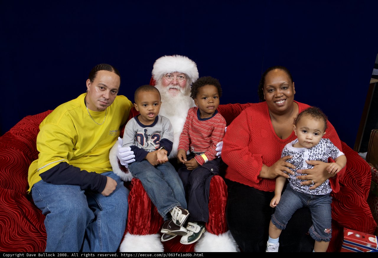 Santa Claus with a Happy Family