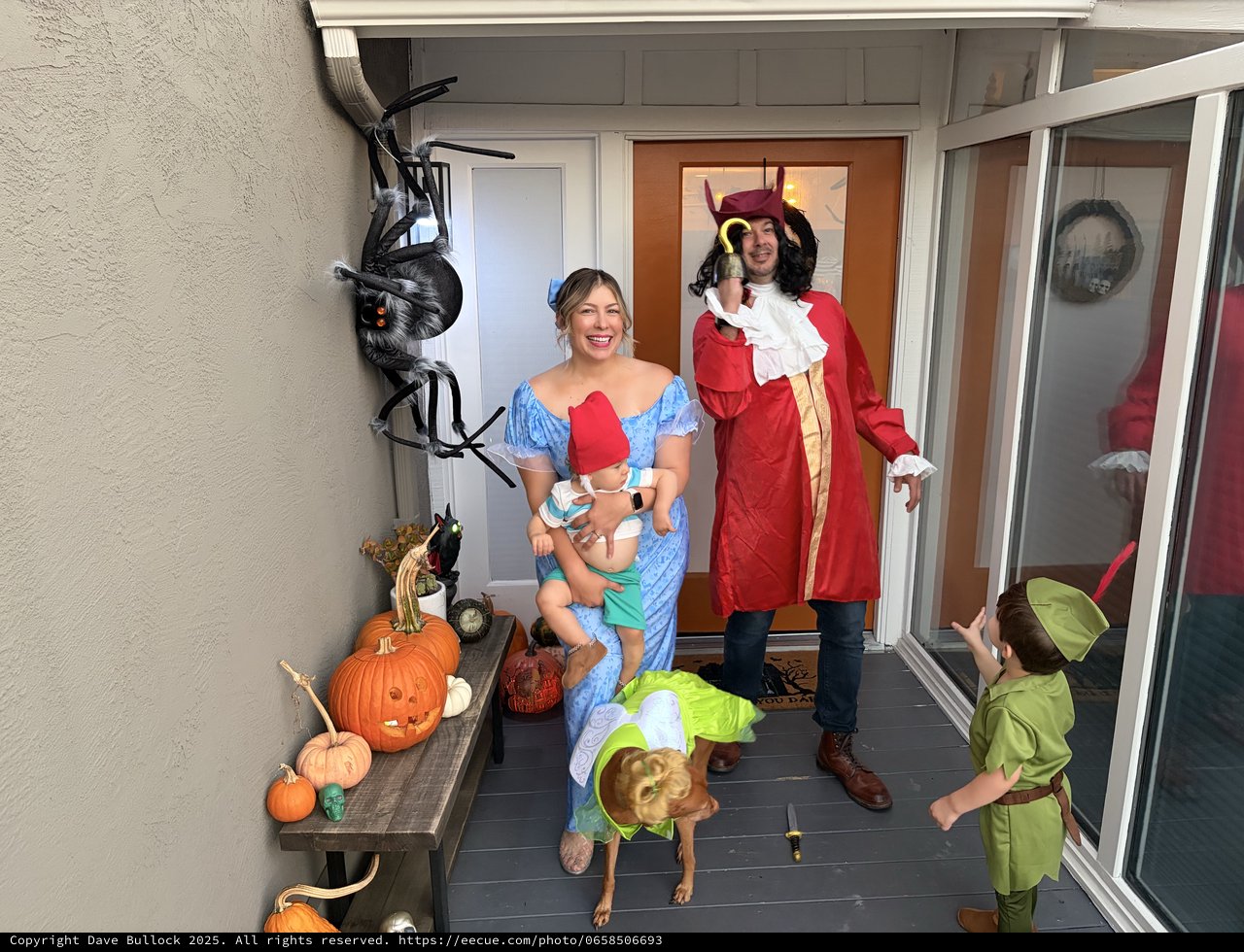 Family Peter Pan Halloween Costumes on Front Porch