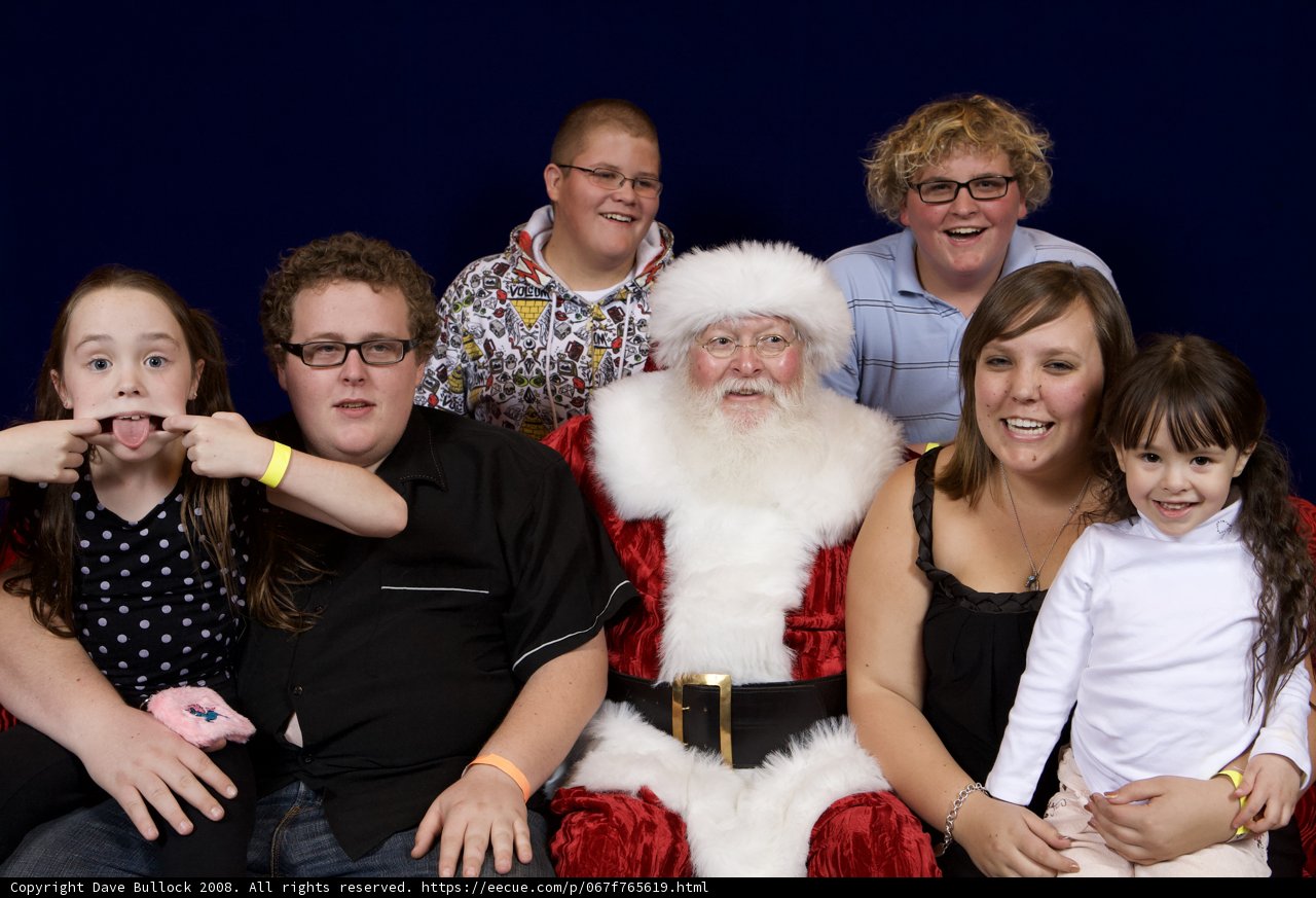 Family Christmas Photo with Santa Claus
