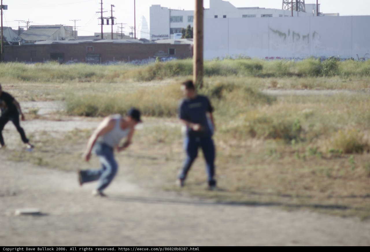 A Game of Baseball in the Open Field