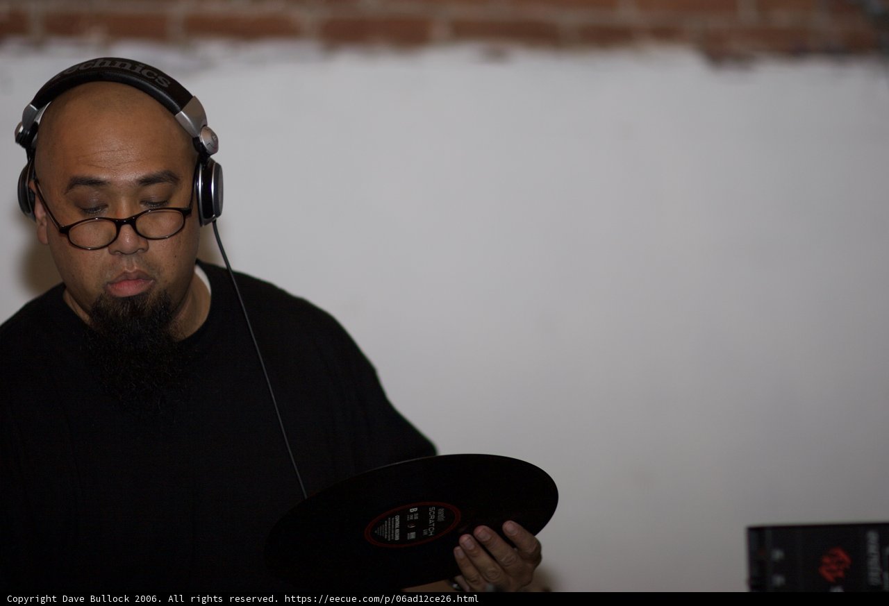 DJ Rhettmatic Grooves with Vinyl Record