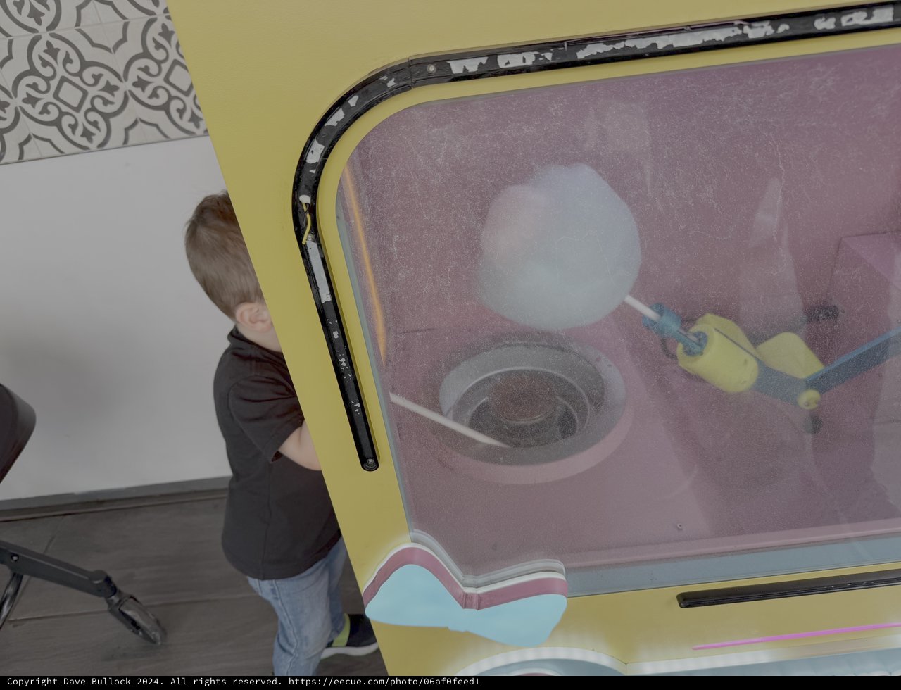 Child Exploring Interactive Science Museum Display