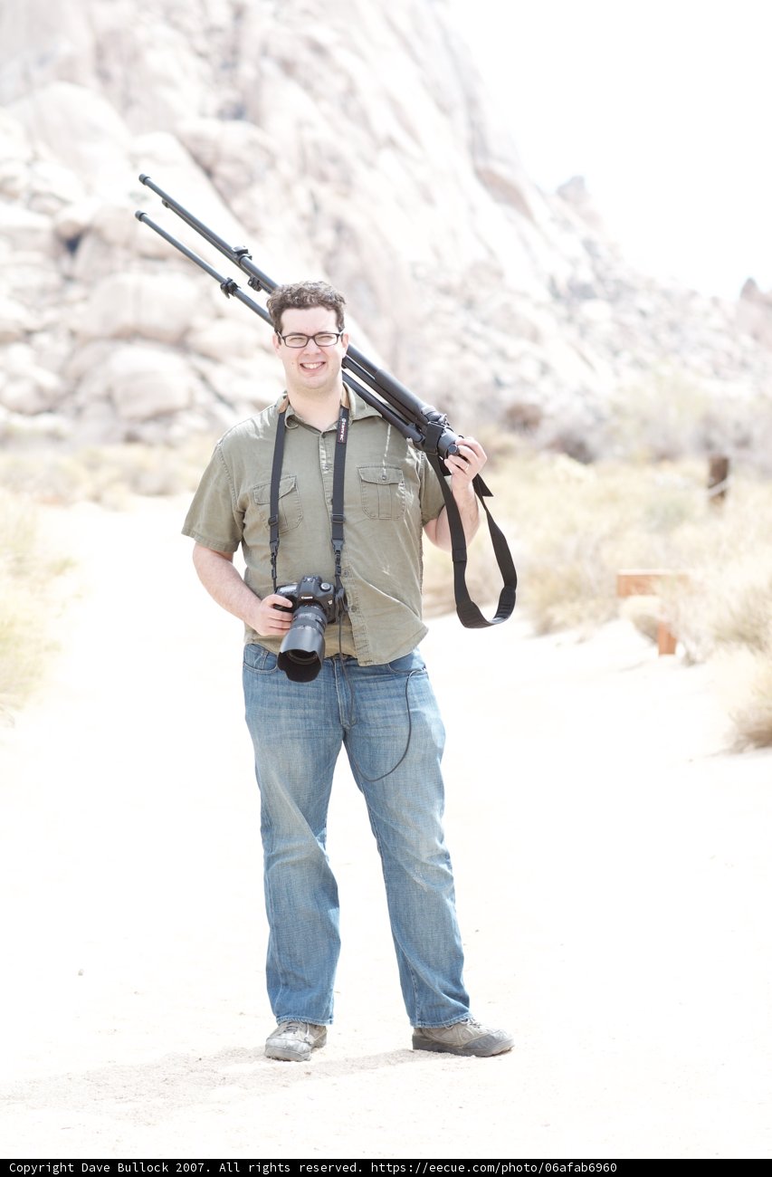 Desert Explorer with Camera and Rifle