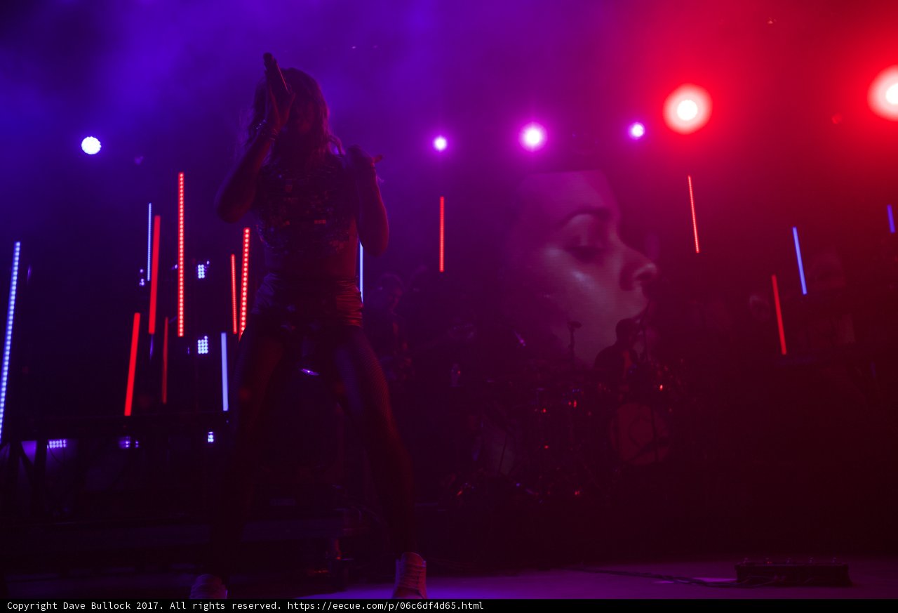 Red and Purple Spotlight on Female Performer