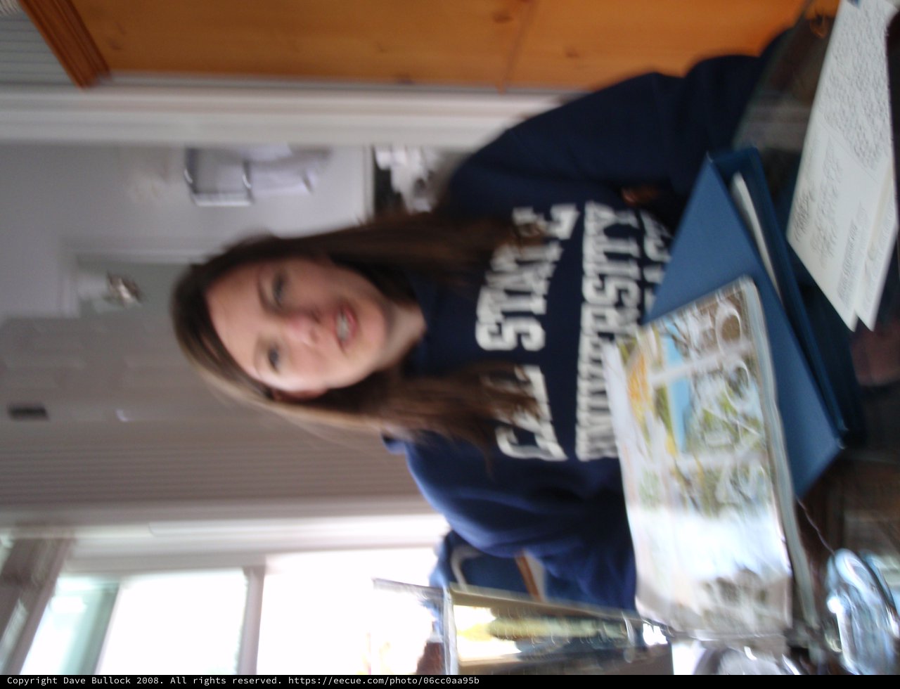 Young Woman in Penn State Sweatshirt at Home