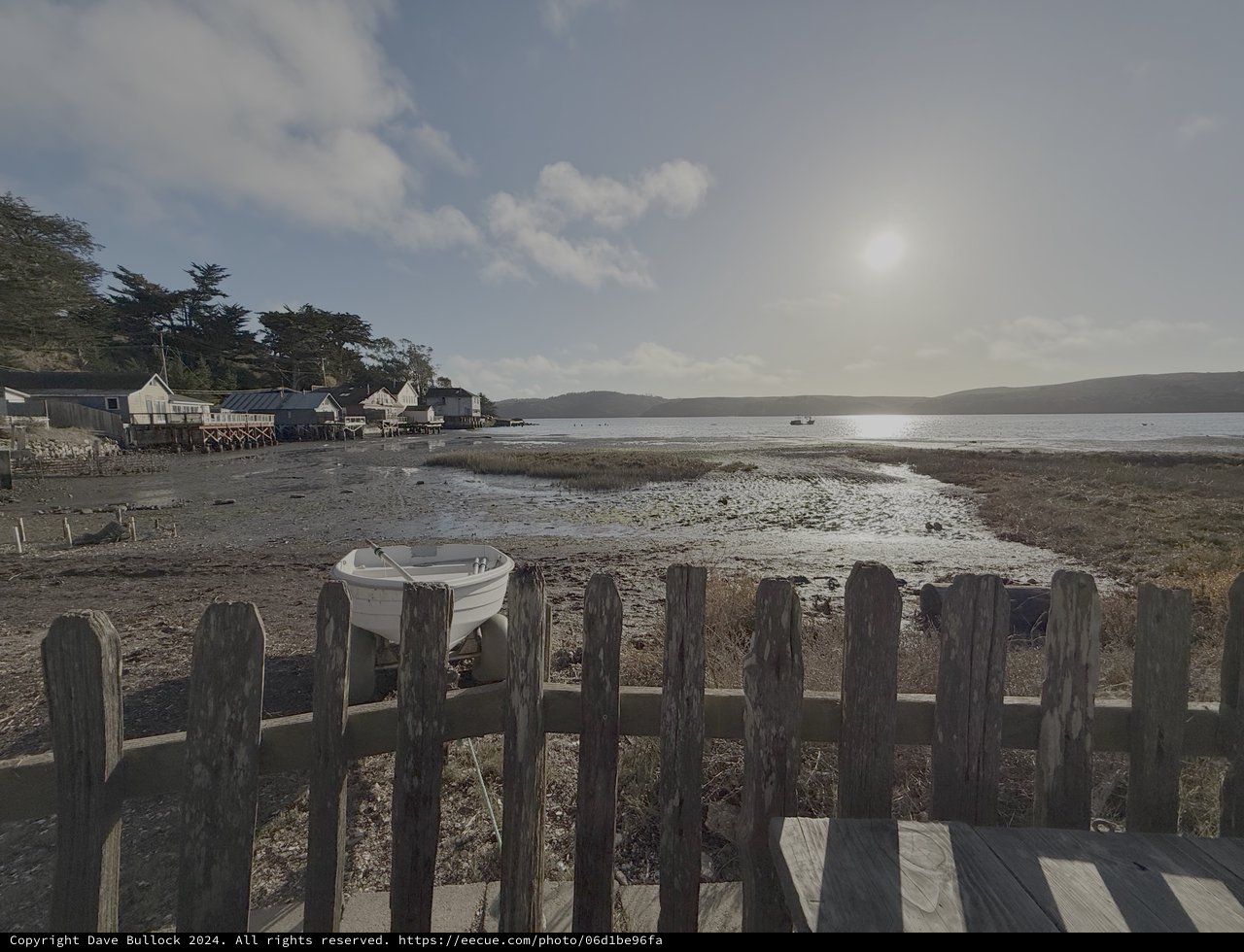 Coastal Village at Low Tide with Boat