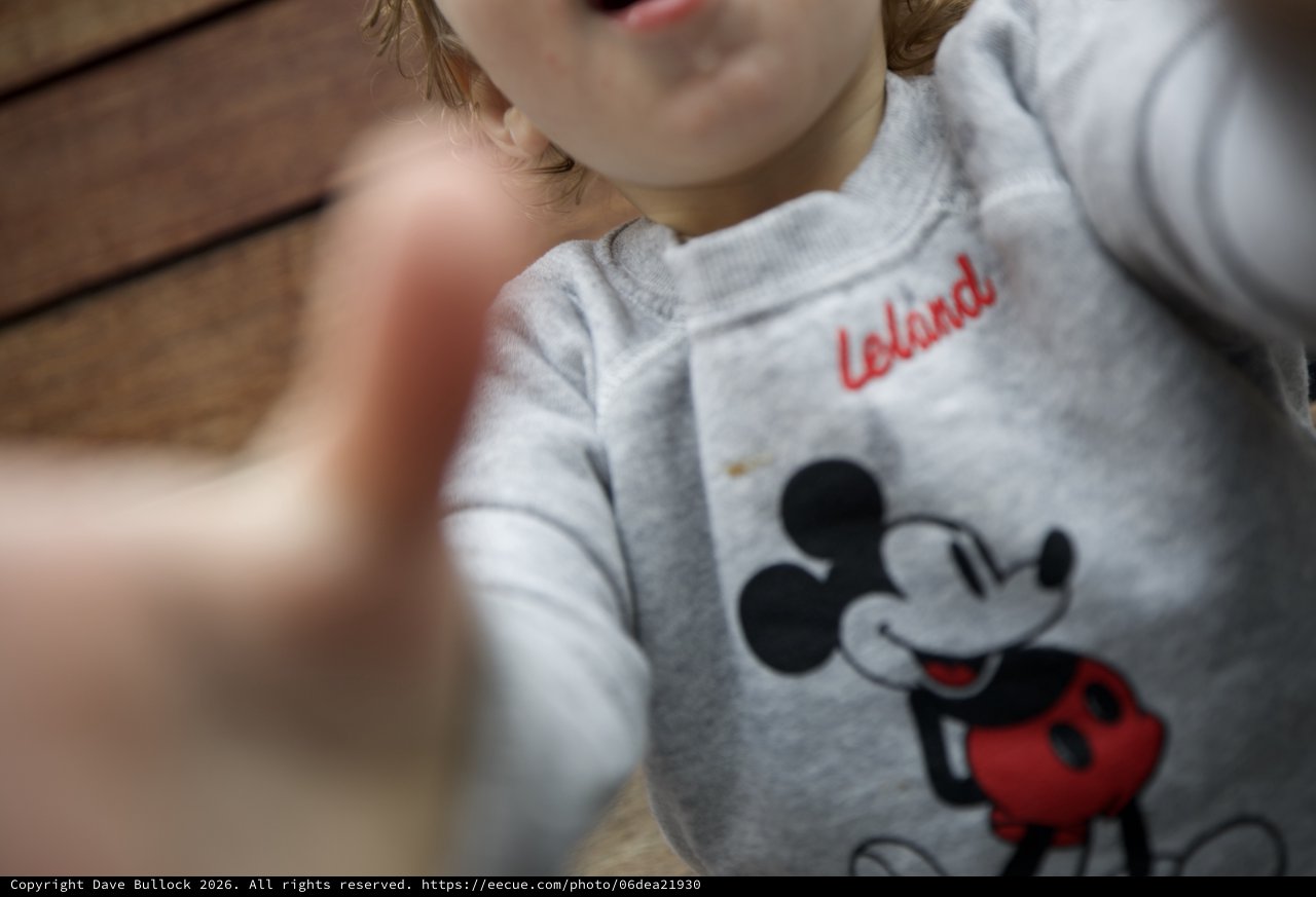 Child in Mickey Mouse Sweatshirt with Personalized Name