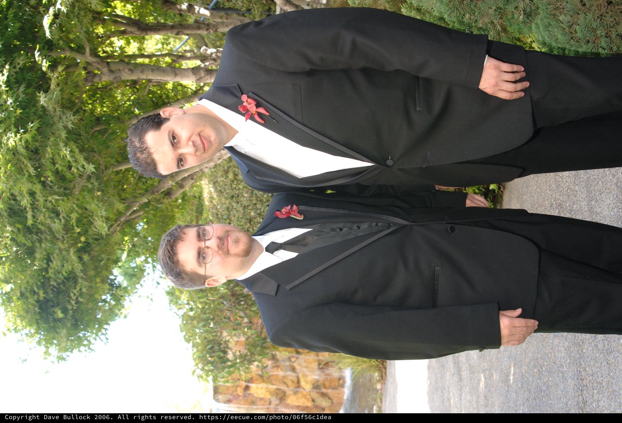Two Groomsmen Posed Outdoors at Summer Wedding