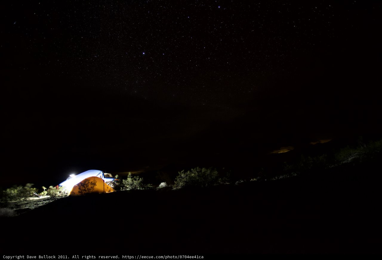 Mountain Tent Glowing Under the Night Sky