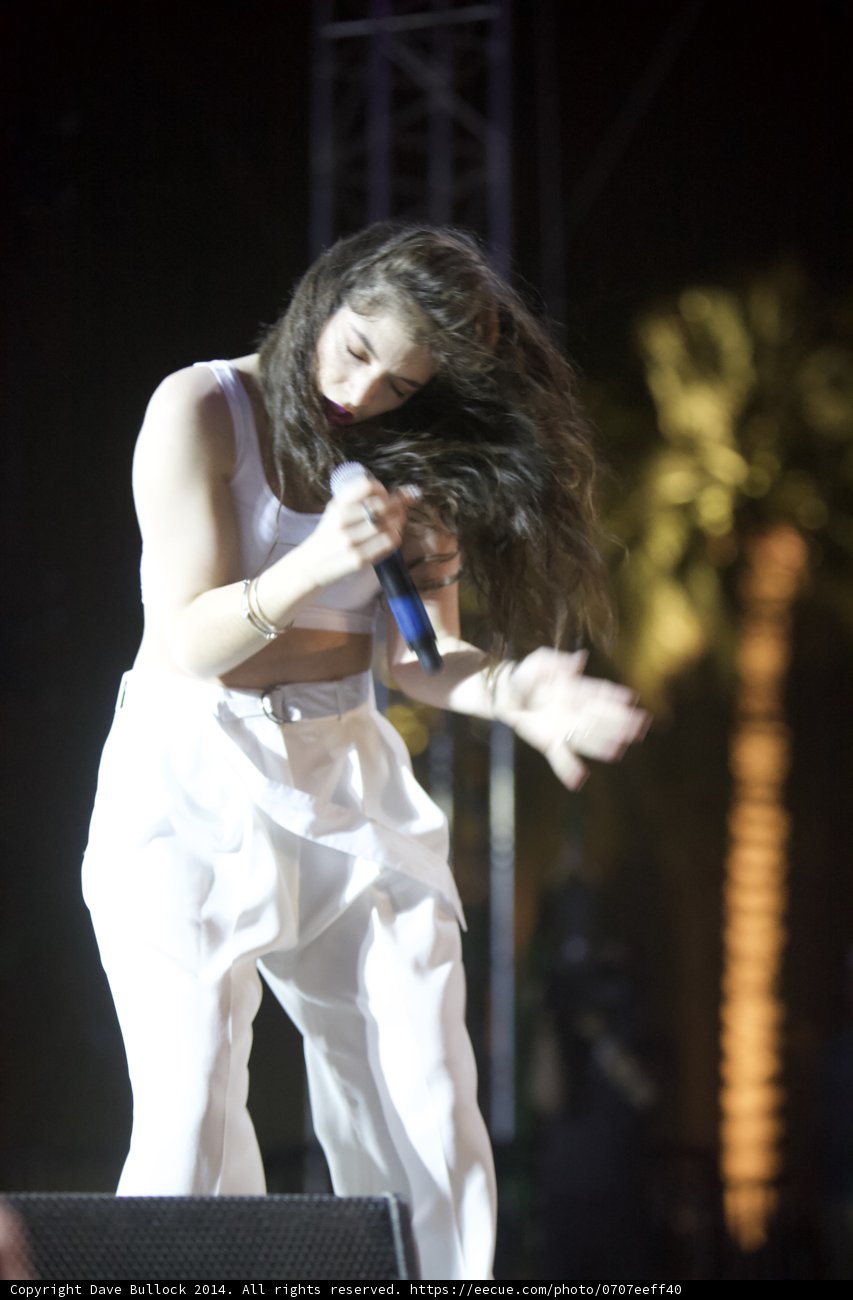 Lorde Takes the Stage in Chic White Outfit