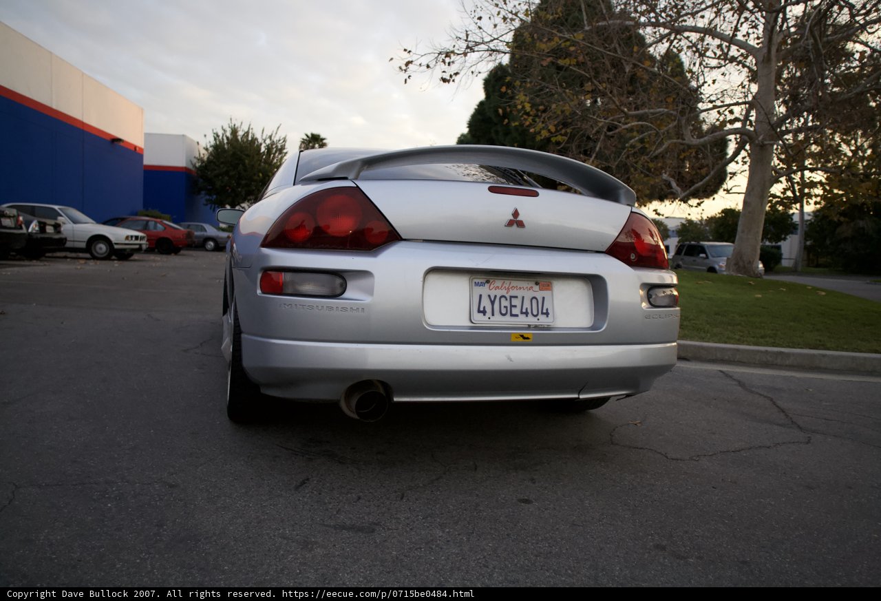 Silver Sportscar parked in a cloudy parking lot
