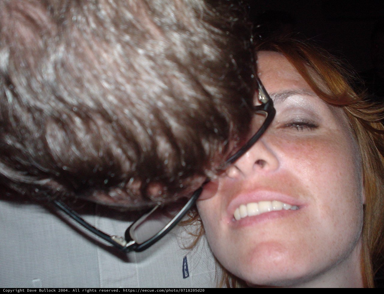 Close-Up Encounter: Woman Smiling with Animal