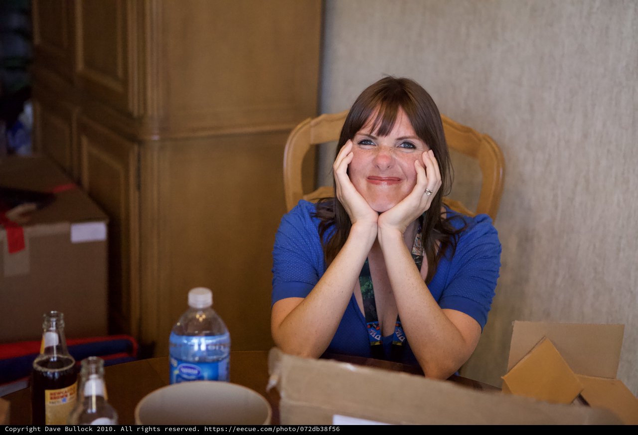 Cheerful Woman Resting at DEF CON 18 Conference