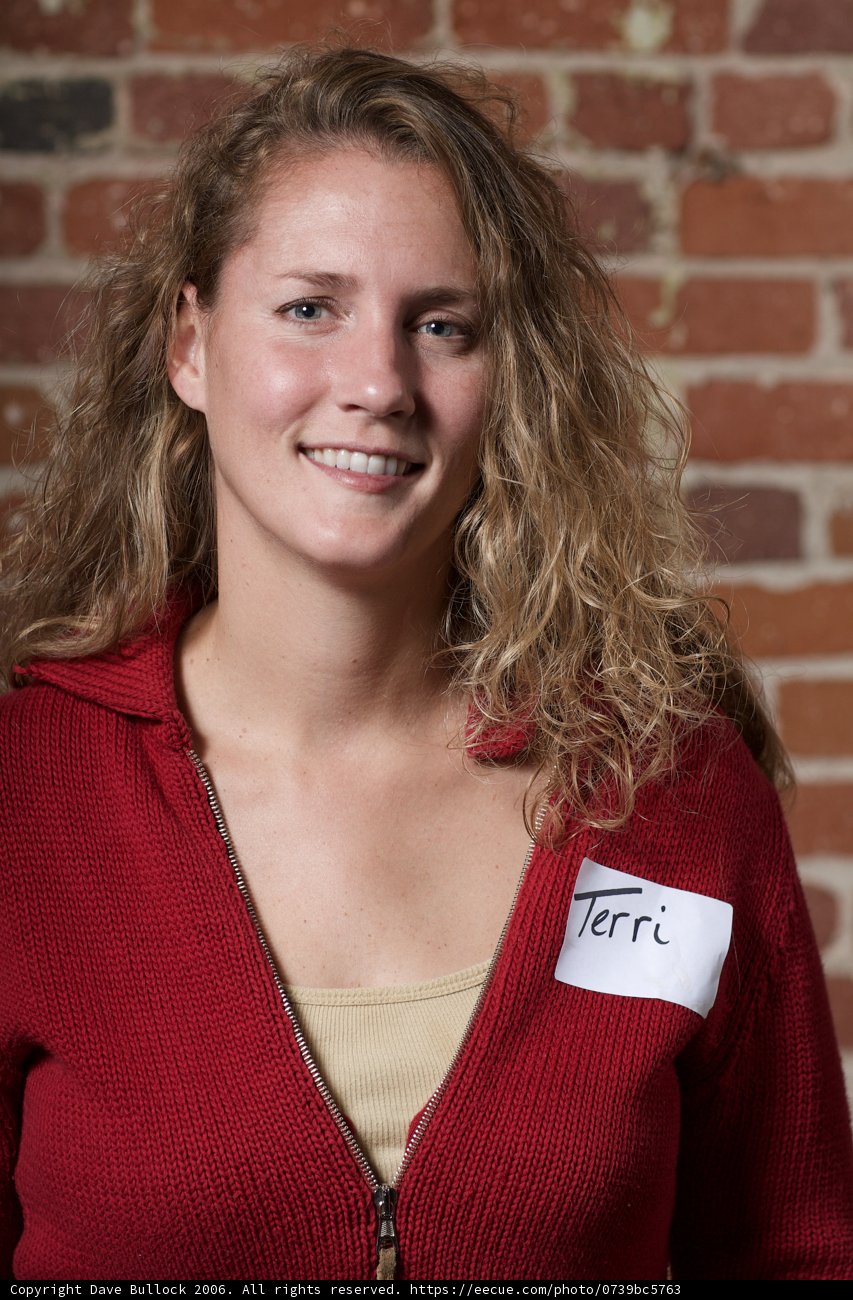 Red sweater, white tag