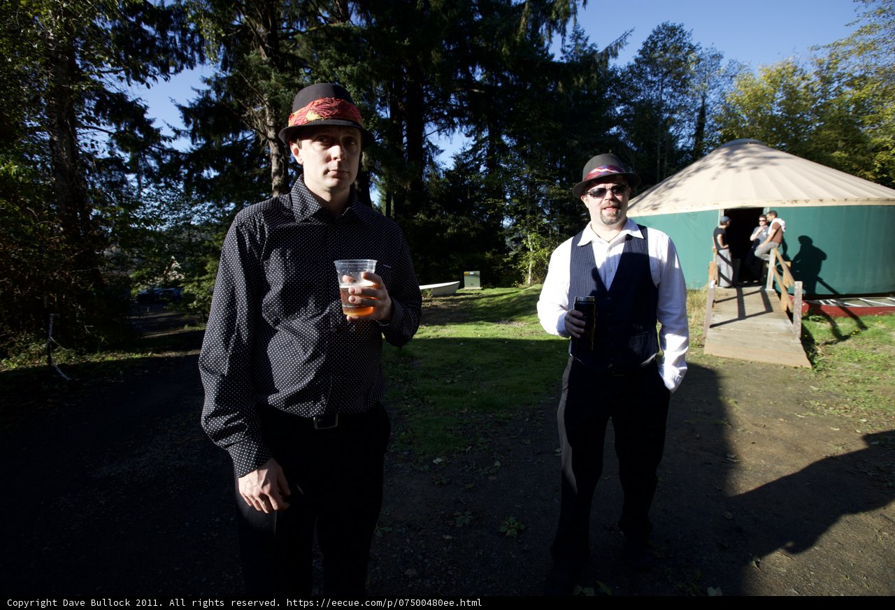 Two Dapper Men in Front of a Traditional Yurt