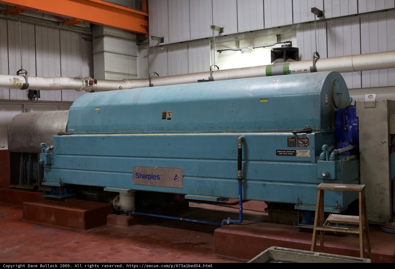 Massive Blue Turret Machine in Warehouse