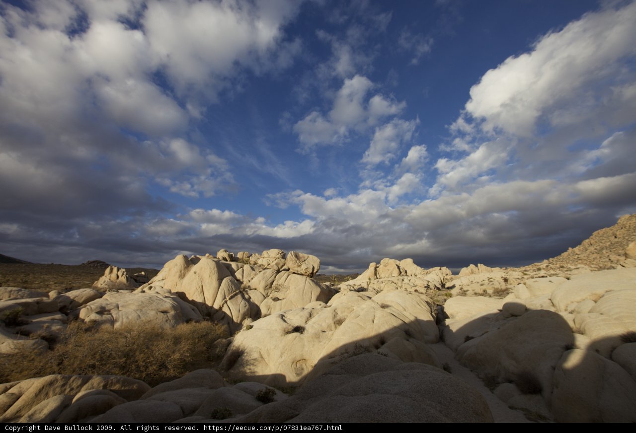 Cloudy Sky over Rocky Desert