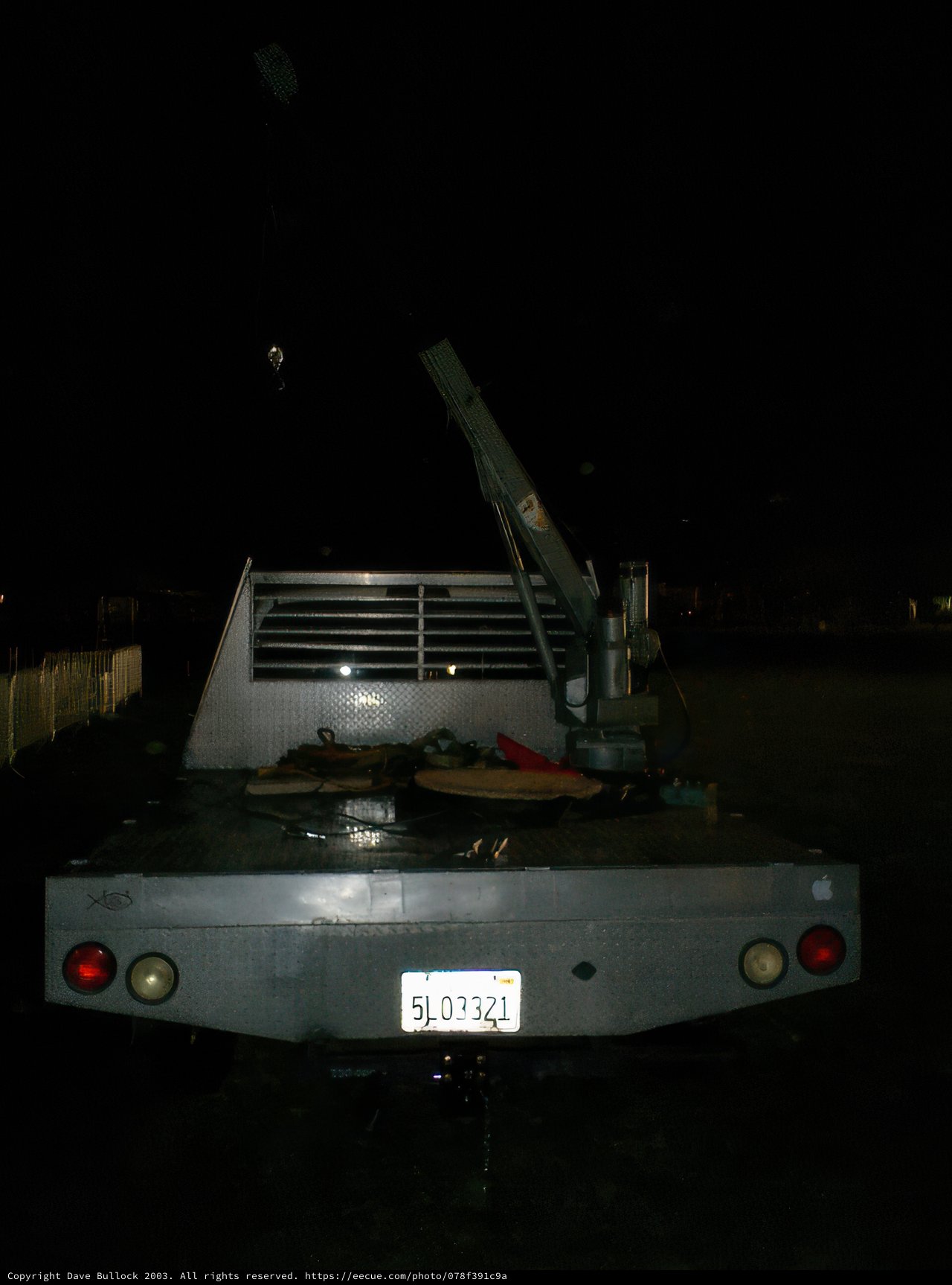 Tow truck with crane at night