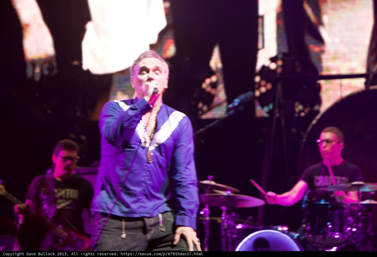 Morrissey Singing Open Shirt Blue Shirt Necklaces Bassist Glasses Capitol Tee Drummer Glasses Capitol Tee Smiths Dangling Hands Screen