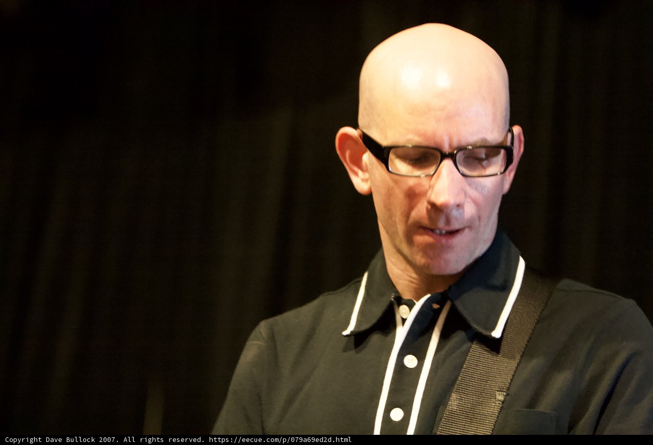 Portrait of a Bald Man with Glasses