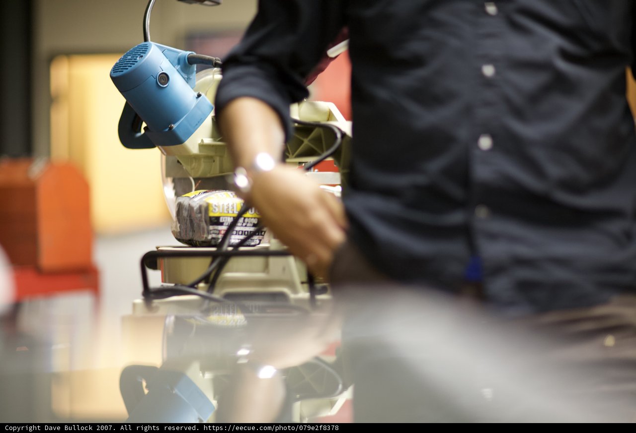 Man Operating an Industrial Coffee Machine