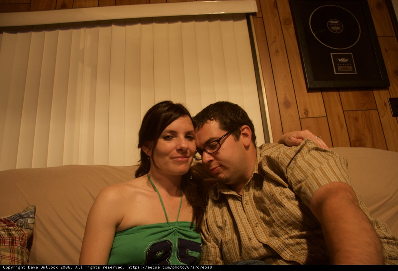 Couple Relaxing Together on Couch at Home