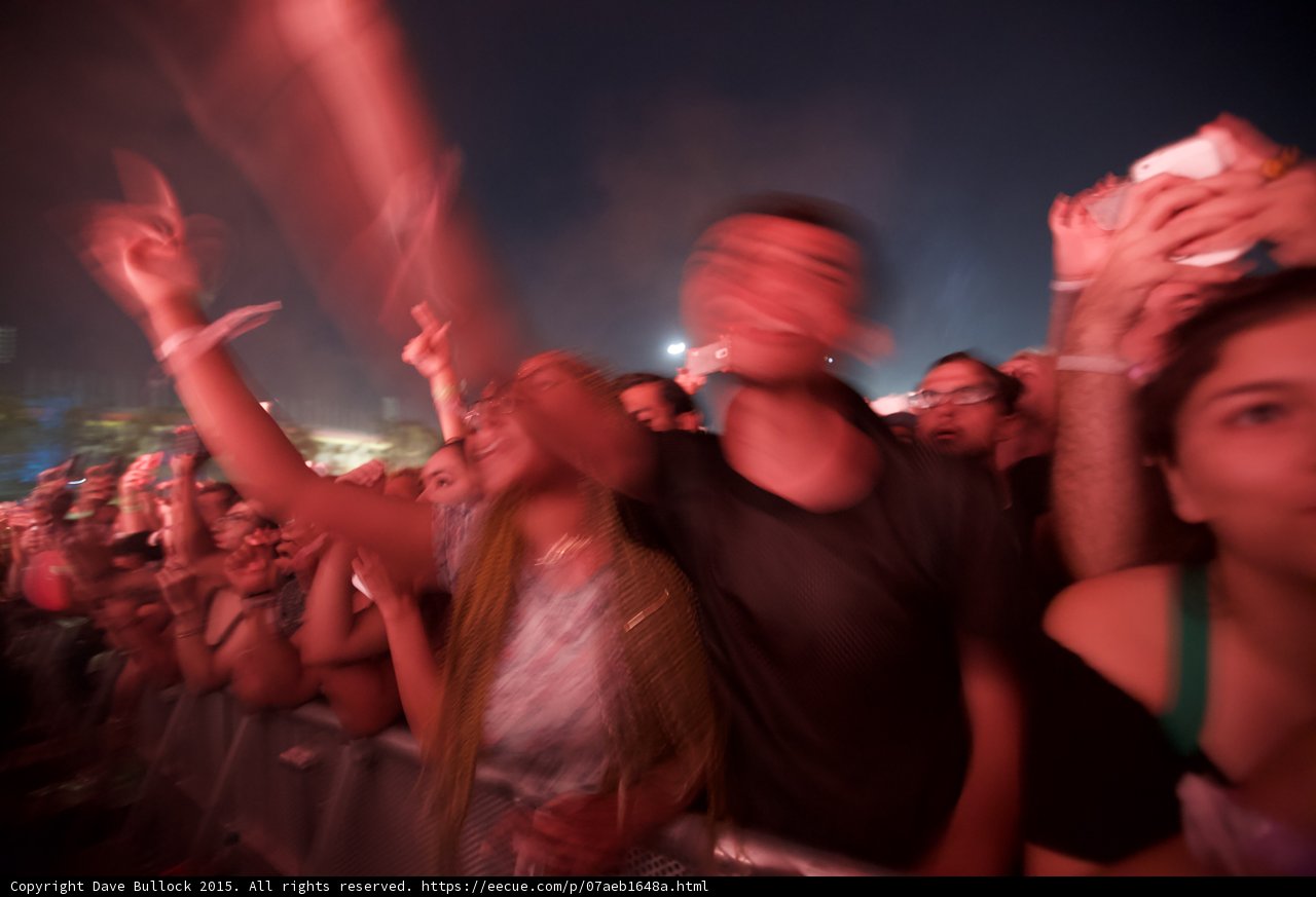 FYF Fest Motion Blur Barrier Dancing Blonde Hair Arms Raised Black Shirt Woman Phone Red Lighting