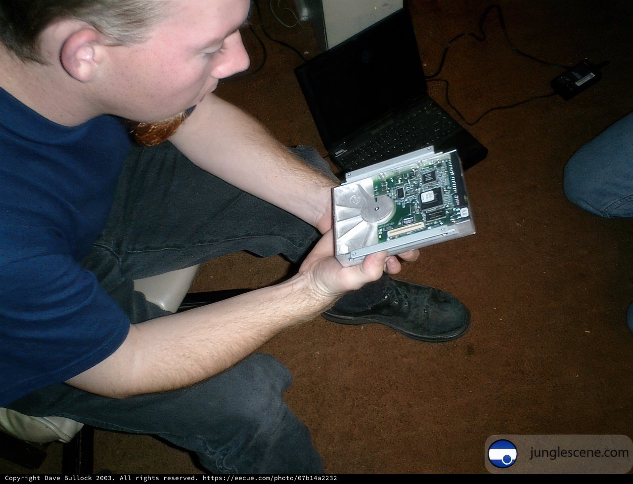 Man holding a small electronic device