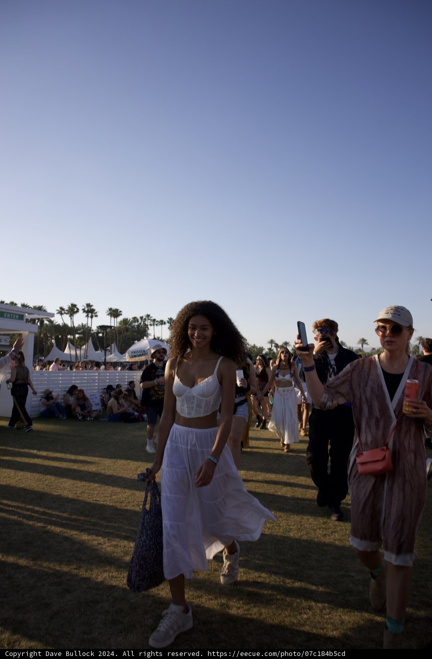 Elegance in Motion: A Fashionable Sunset Stroll at Coachella 2024